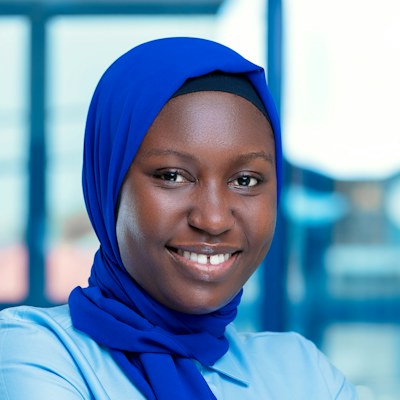 Claudine U., home customer in Kigali